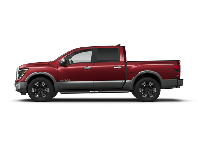 Profile view of a red 2024 Nissan Titan | Nissan dealer in Norfolk, VA | Banister Nissan of Norfolk